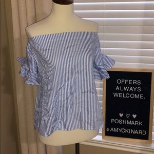 Off the shoulder, ruffle sleeve striped shirt.
